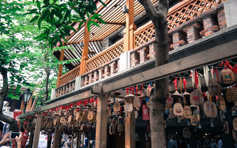 Hanging Ornaments Surrounded by Green Trees in Lingnan Tiandi